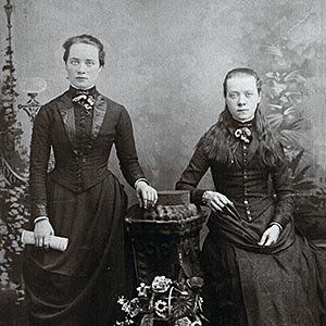 Portrait of two home children - young women