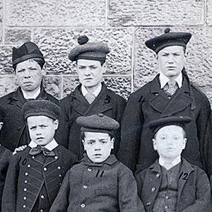 The boys of Cottage 1, accompanied by Mr Paterson, soon to sail for Canada