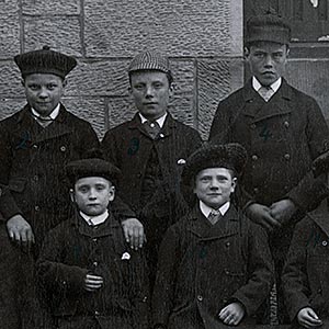 The boys of Cottage 1, 'Broadfield Home' with Mr & Mrs Paterson